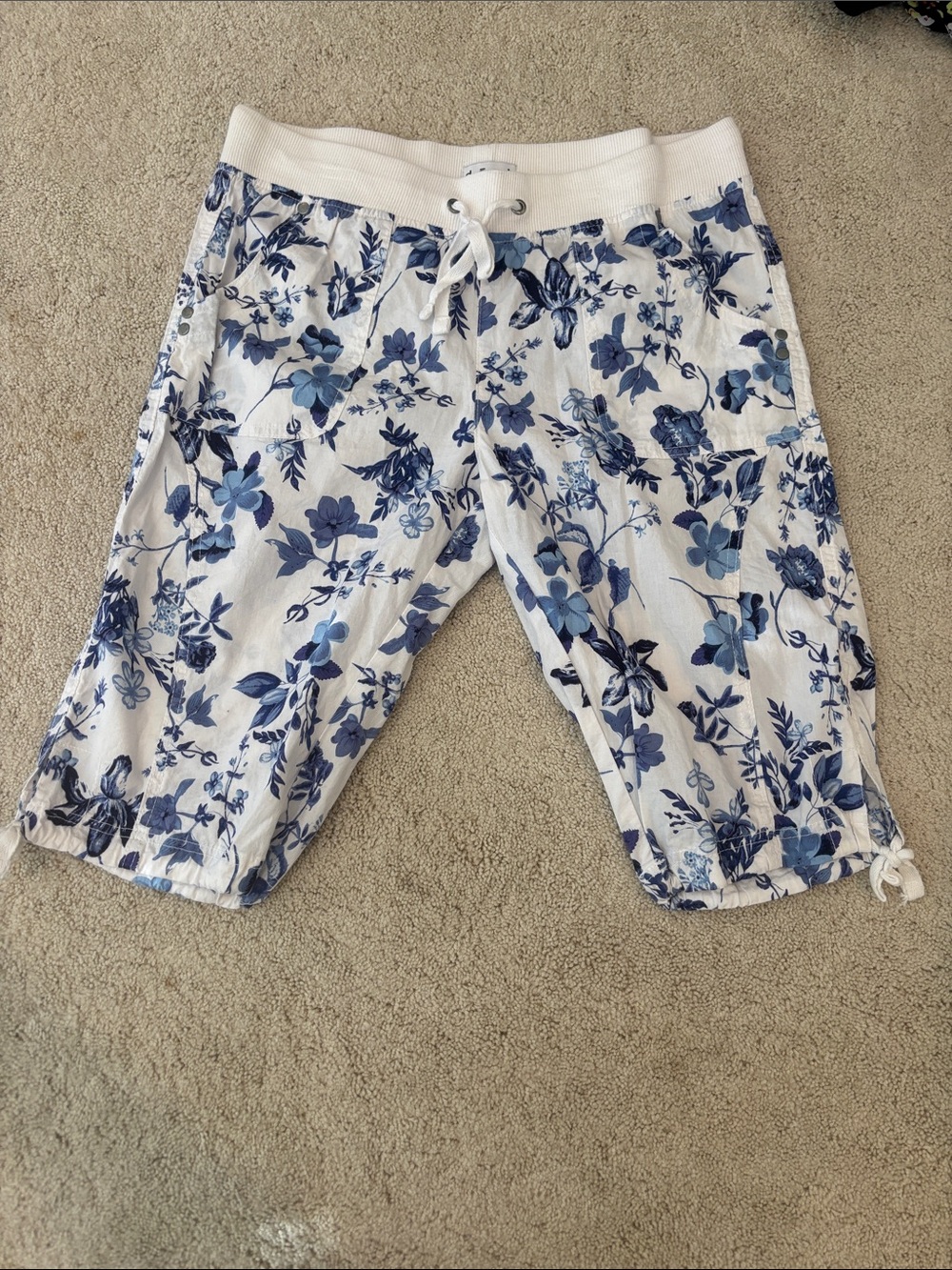 Women’s White Athletic Shorts with Blue Floral Print